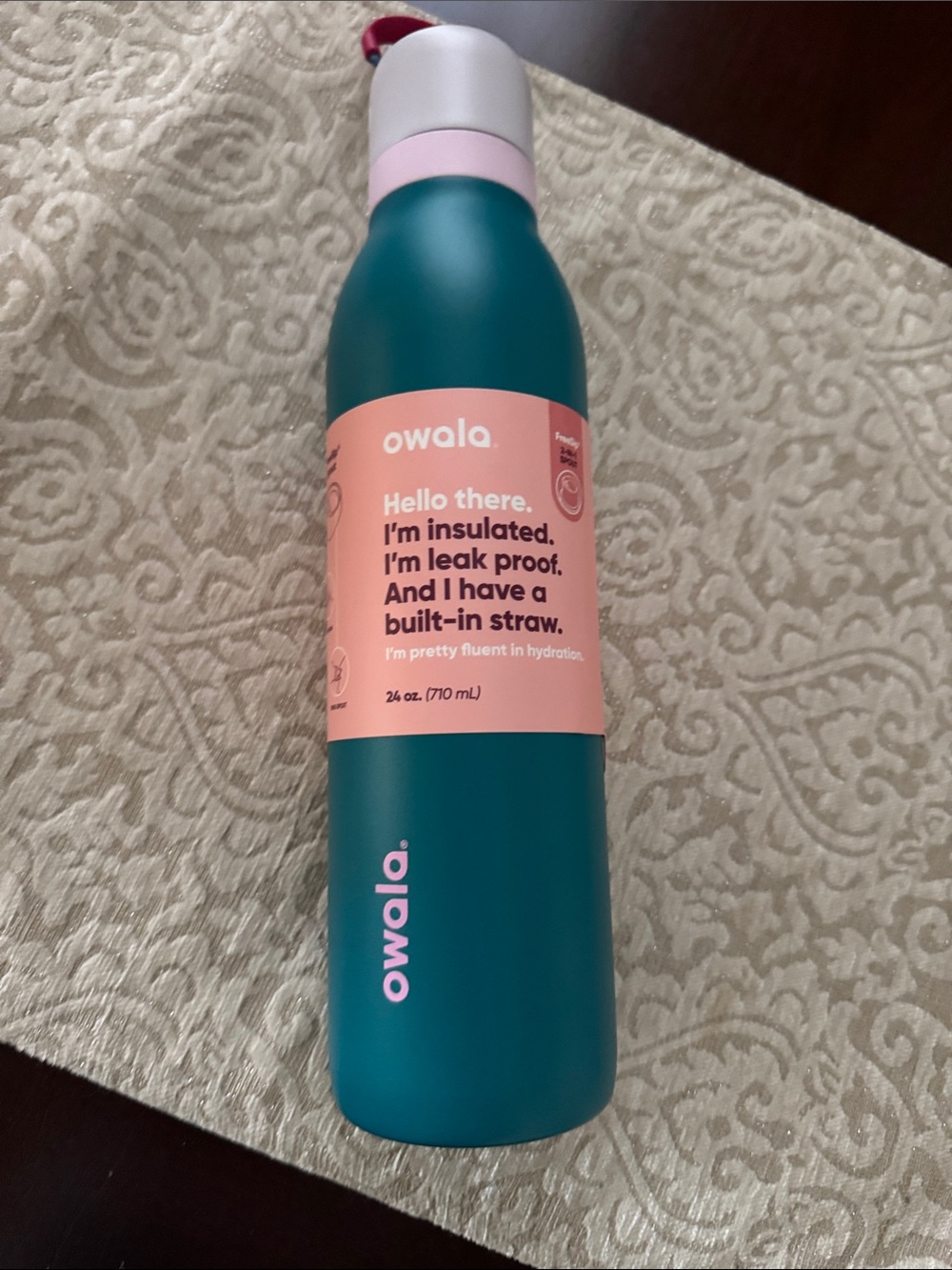 Owala Insulated Water Bottle in Teal with Pink Accent